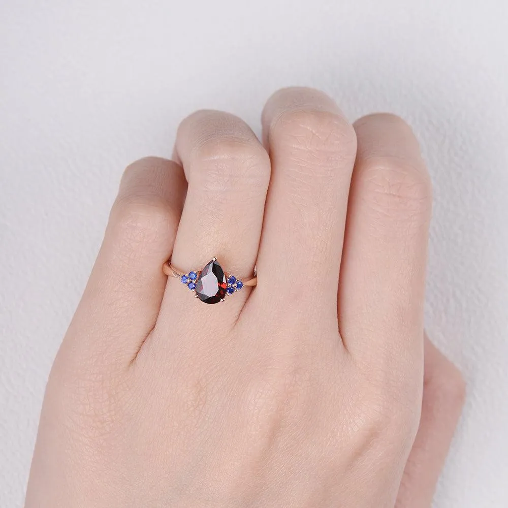 1.5ct Pear Shaped Garnet Rose Gold Ring